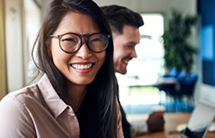 smiling woman wearing glasses